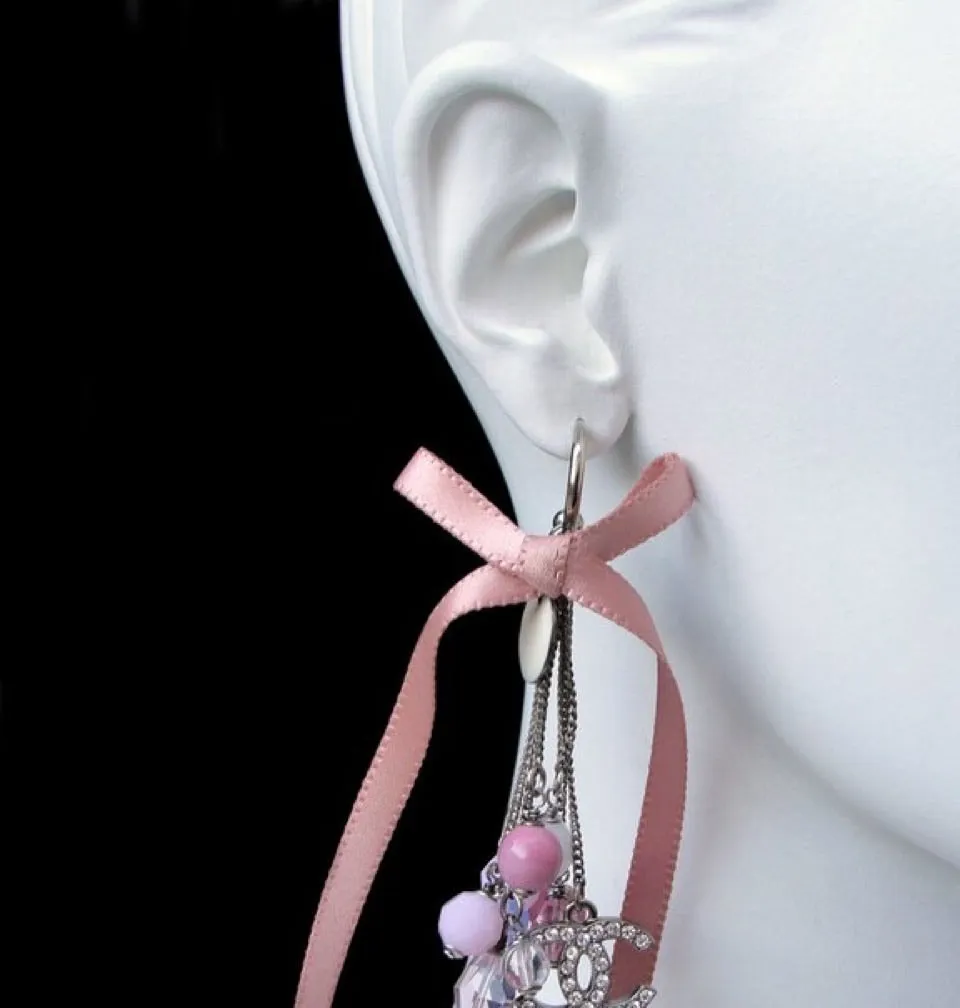 Chanel extra long pink 07C Ribbon bead & Crystal logo earrings