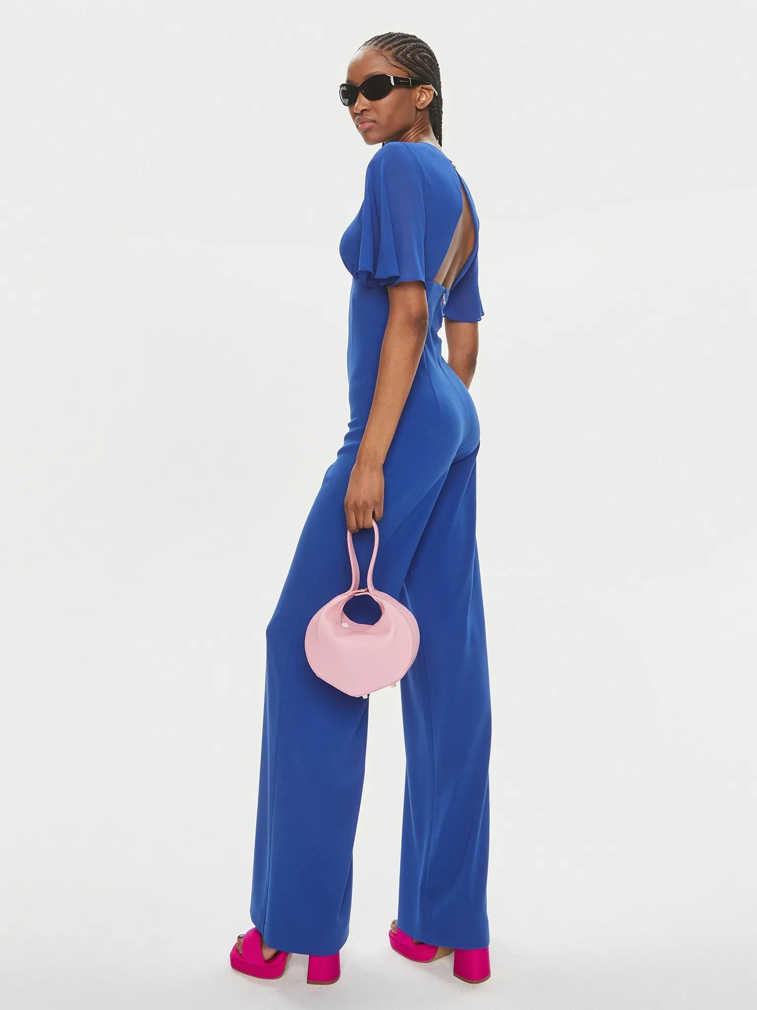 V-neck jumpsuit in sablé crepe fabric in Blue Wave