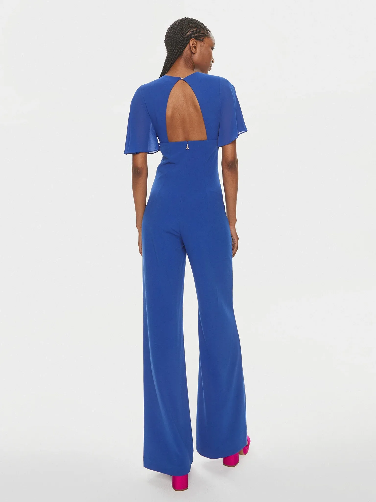 V-neck jumpsuit in sablé crepe fabric in Blue Wave